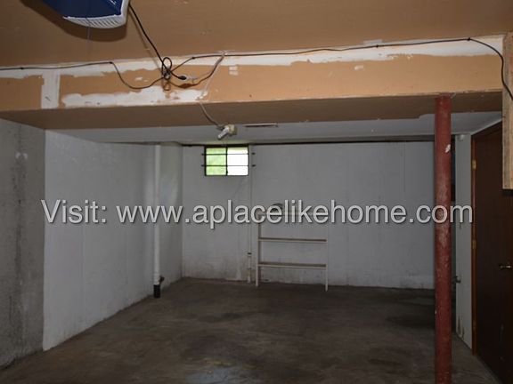 5th image of 408 NE Timbercreek Dr
