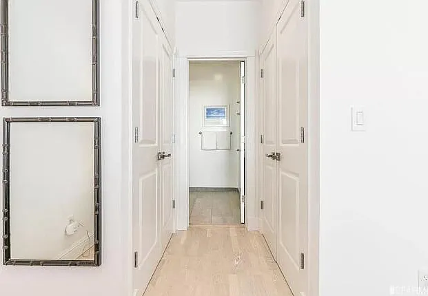 Ensuite master bathroom, with 2 big closets+built ins on either side.