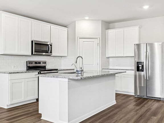 Check out the Ross floorplan with the Cool interior package in Eastern Wells.