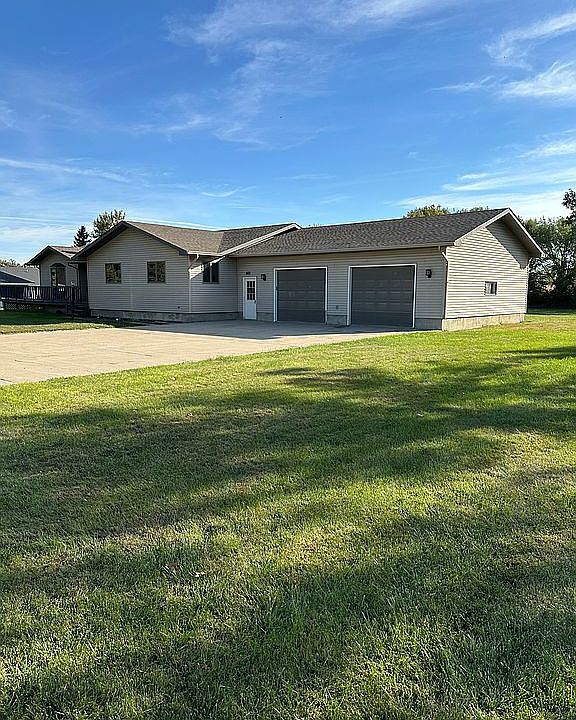 Front with cement driveway 