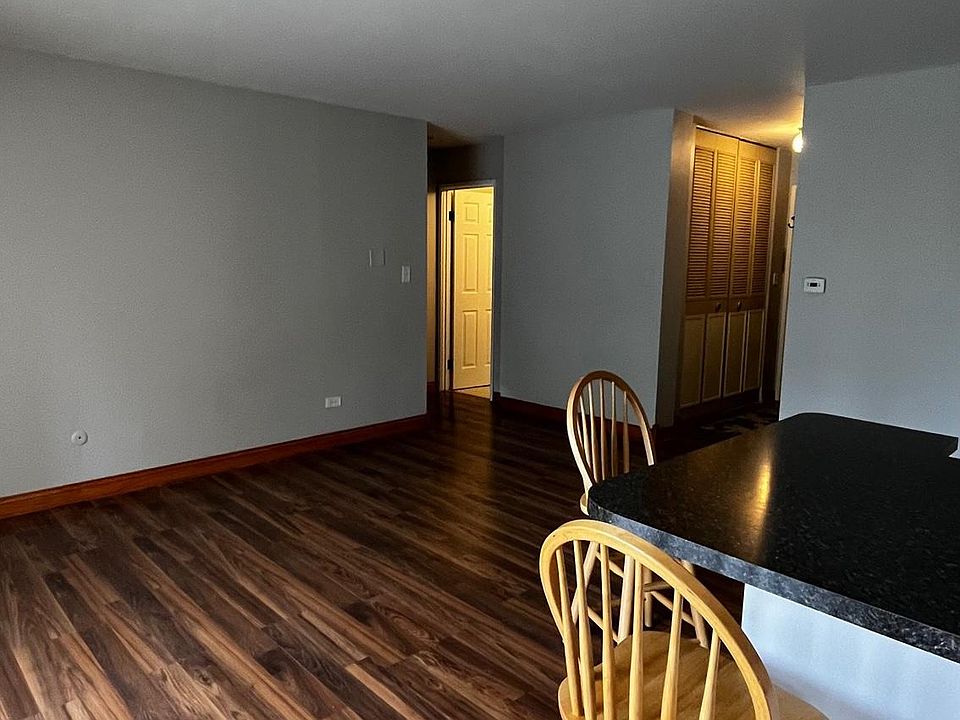 Front entrance and bathroom entrance from kitchen.