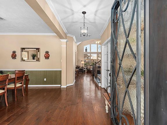 The custom front door shows the pride of ownership in this home at the first step.