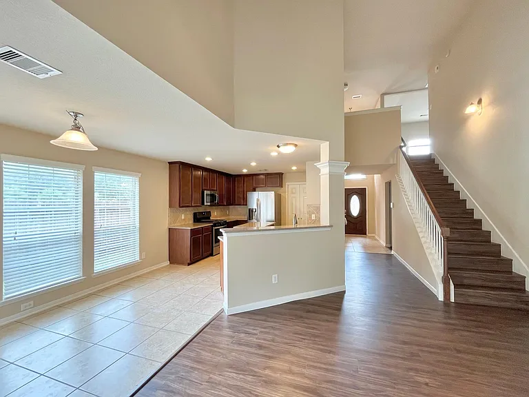 looking into breakfast area, kitchen, and foyer.