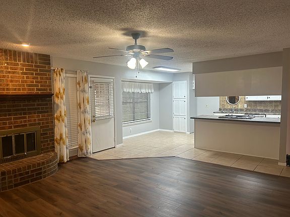 Living, dining and kitchen area
