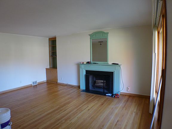 Nice Living room with hardwood floors and real wood burning