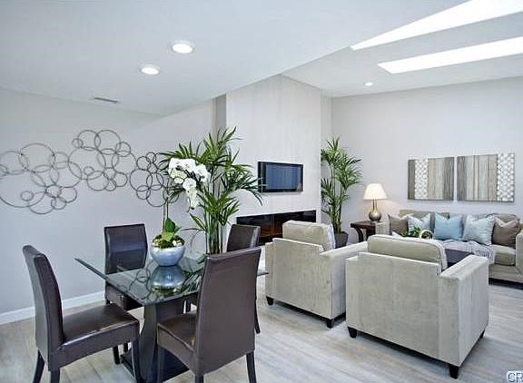 LIVING/DINING AREA WITH SKYLIGHTS