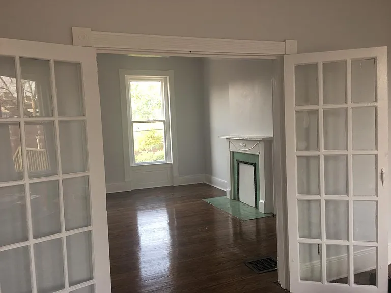 Living room looking into dining room.