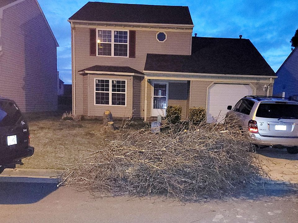 Front of the house after the tree was removed.