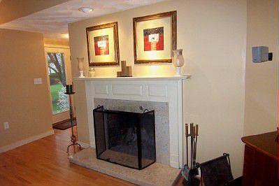 Newly refinished Fireplace with Recessed Lighting
