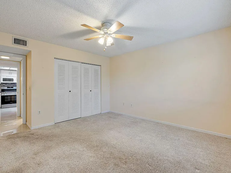 5011 Wiles Rd #303 — Photo 25