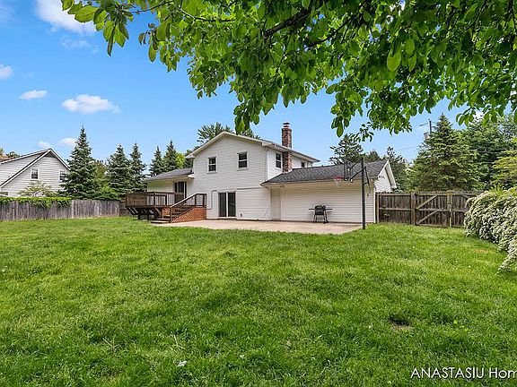 Private, fenced in Backyard with Shed