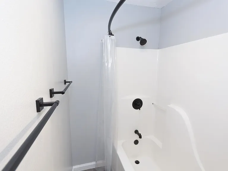 Bathroom with modern fixtures and lighting