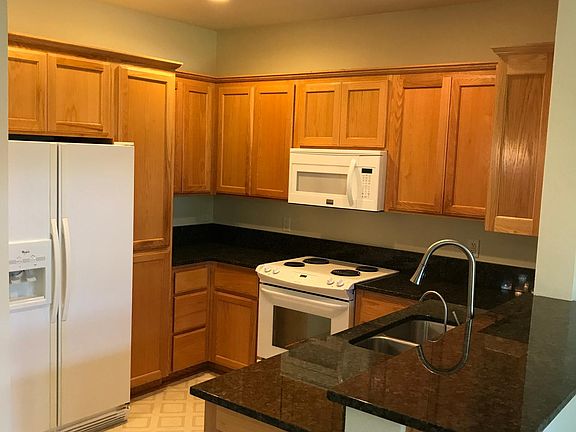 custom kitchen with granite counters