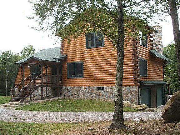 Front, tucked under oversize 2 car garage.