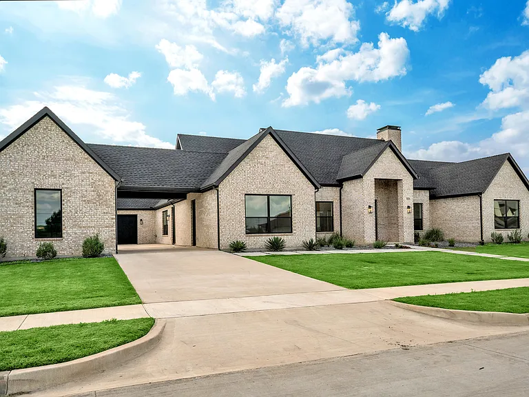 3 car garage with porte cochere