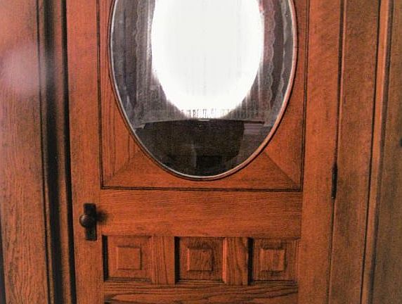 Ornate wood doors in entry.
