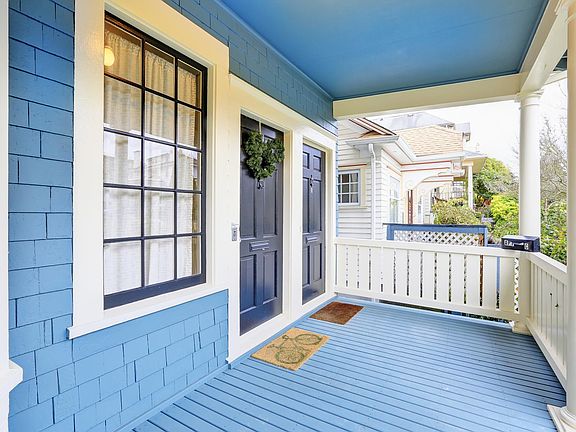 Covered front porch, the door to unit A is on the left
