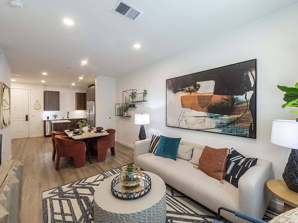 Relax and entertain in a generously sized living room, offering ample space for comfort and style.