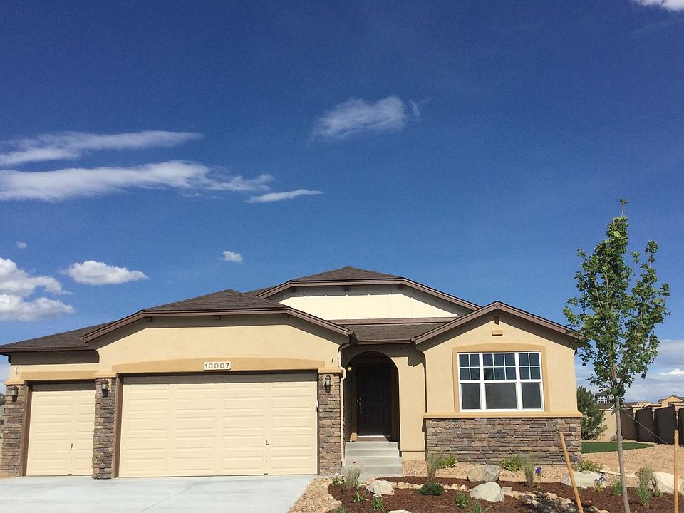 Spacious ranch home with 5 bedrooms, flex space and open main level. Photo of model
