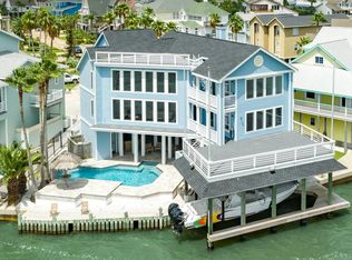 911 Long Reach Dr, Tiki Island, TX 77554