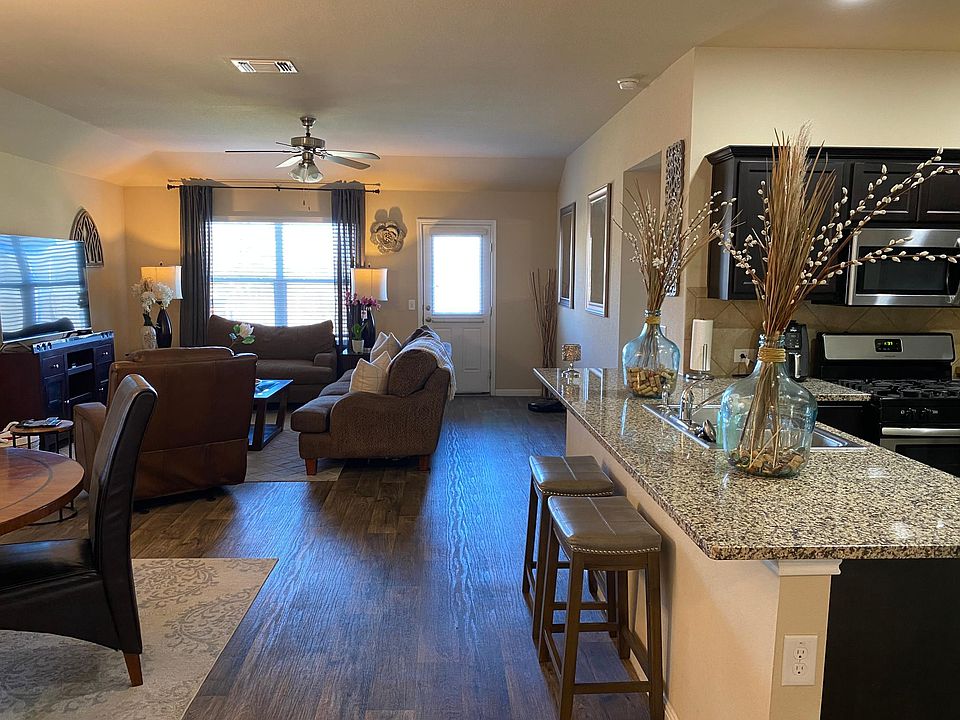 Kitchen on the right, dining on the left, living room in the far back.