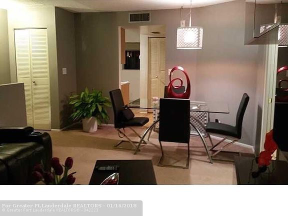 4th image of 303 Gardens Dr APT 204