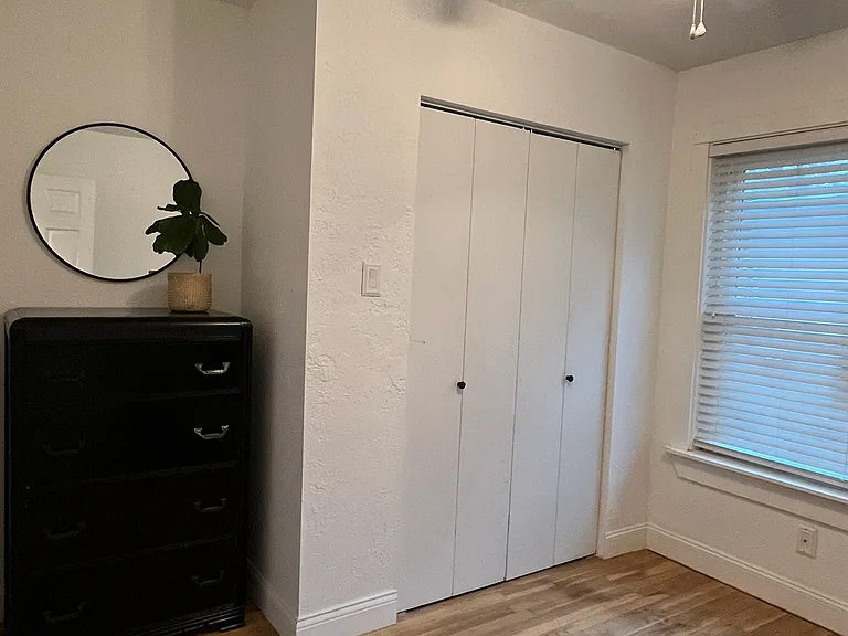 Bedroom 2 / Furnished with full sized bed and dresser