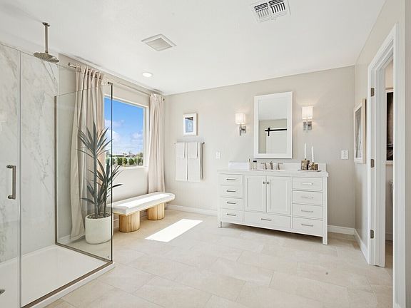 Primary bath with glass shower enclosure
