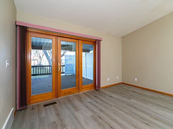 Living Room leading to covered deck.
