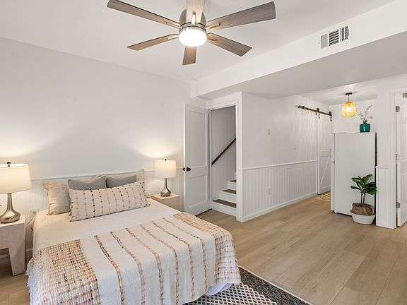 lower level flex space with full bath, kitchenette, second refrigerator and dishwasher.