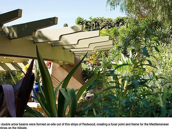 Detail of curved backyard arbor