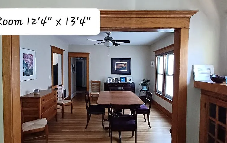 The dining room has a ceiling fan/light and a beautiful vintage dining set. The dining table expands to sit up to 10 people. Linens and napkins included.