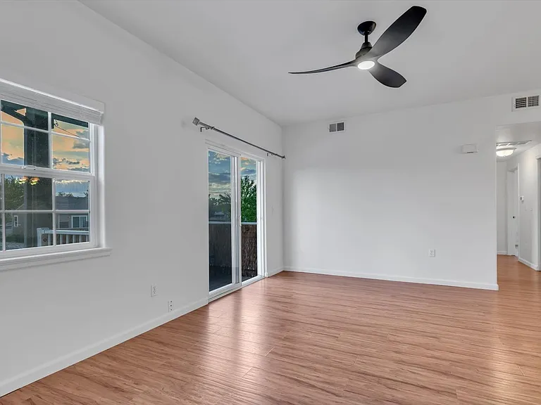 Large living room with modern fan (AC is also included)