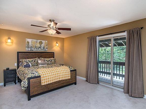 Huge master suite with balcony and wood burning fireplace