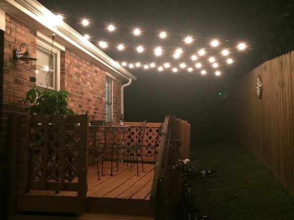 Past tenants with part lights over side deck.