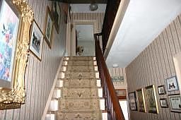 Foyer With Imported Period Wall Coverings 