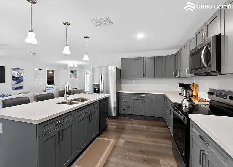 Modern kitchen with island, stainless steel appliances