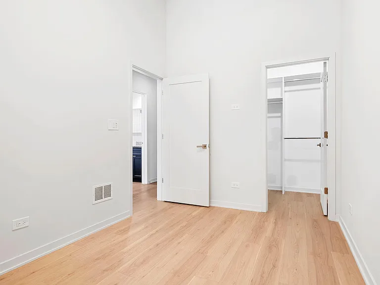 Bedroom #2 with walk-in custom closet