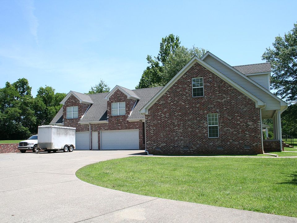 Four car (heated or cooled) garage with huge bonus room above.