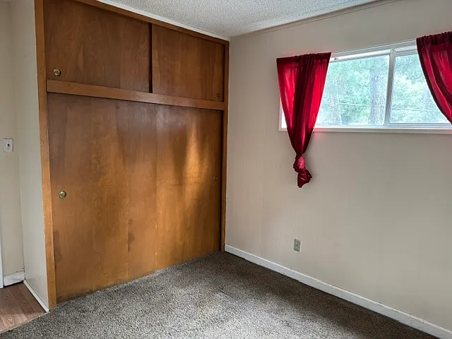 ONE OF TWO BEDROOMS