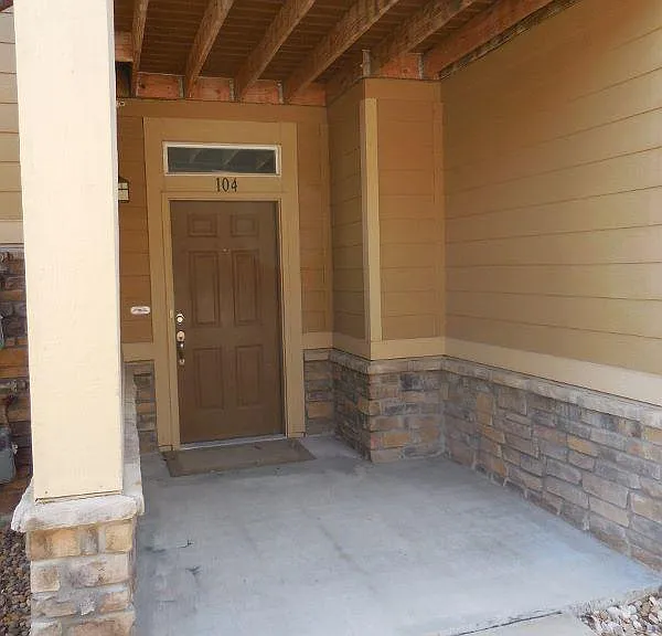 Main entry way to Unit 104, Large enough for patio furniture