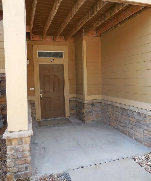 Main entry way to Unit 104, Large enough for patio furniture