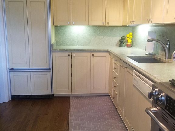 Kitchen: Leather honed granite, Sub-Zero Frig, dishwasher, gas range and plenty of storage.