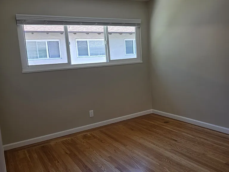 2nd Bedroom. Slightly smaller than the other bedroom.