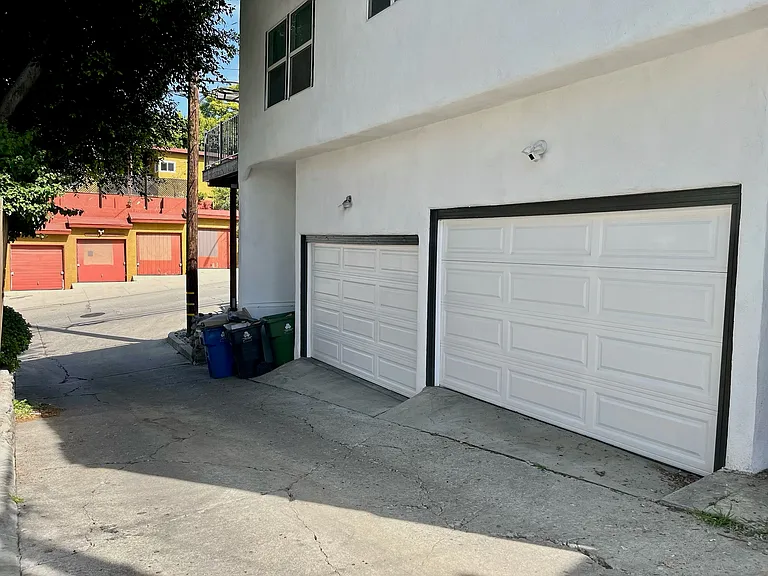 Includes one single car garage that has a wi-fi connected smart garage door opener and plenty of room for storage