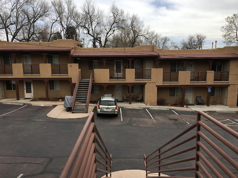 Exterior of Building #15 - 6 unit complex with assigned parking spaces.
