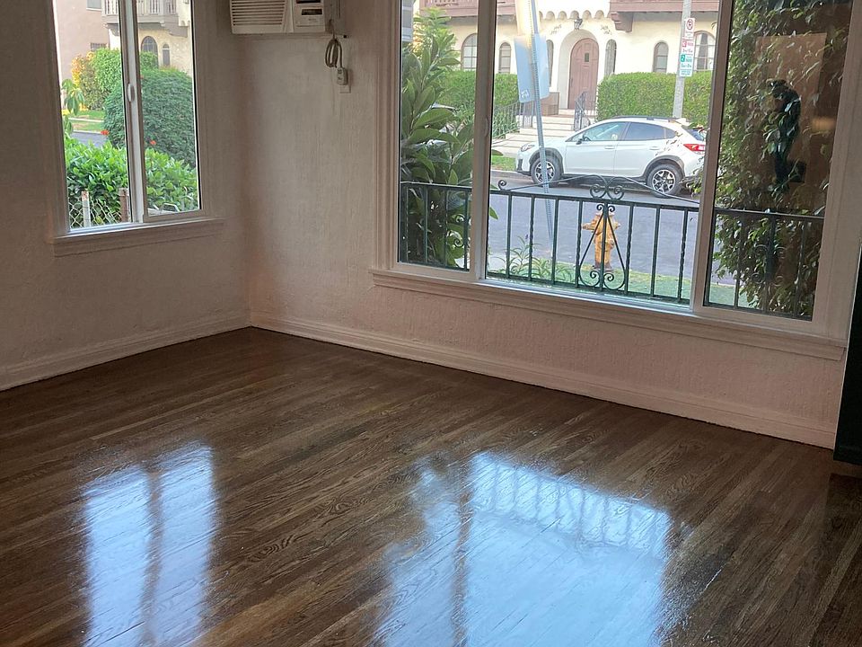 Living room with street view. Spacious and bright.