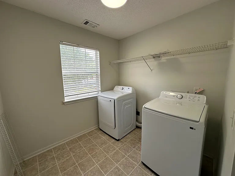 Laundry Room, with new washer and dryer included.
