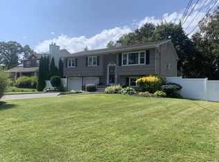 16 Woodland Rd, Centereach, NY 11720