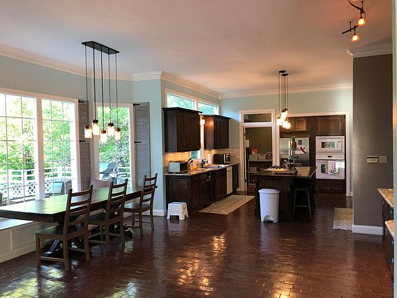 Open concept eat in Kitchen. There is also a formal dining room. (Current renters are packing and I don't have a picture of it.)